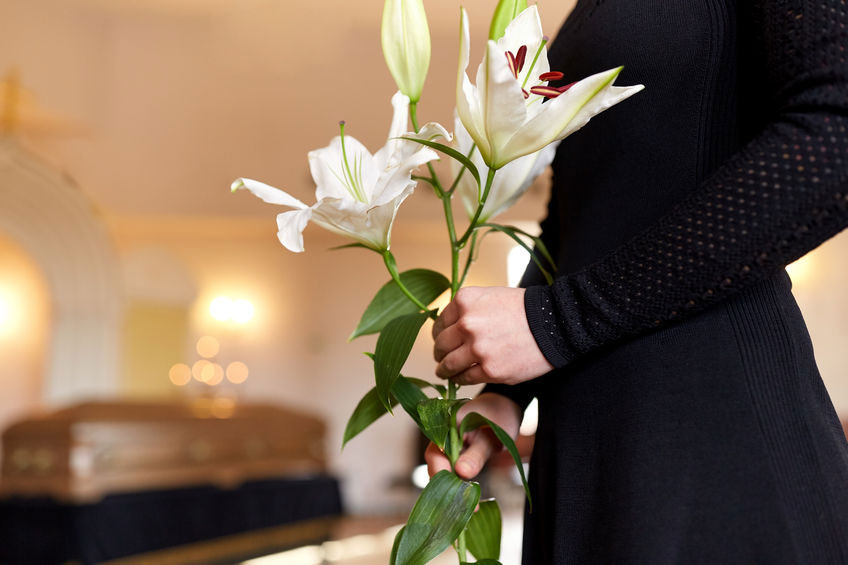 funeral ceremony with flowers